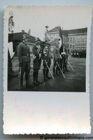 SS photo with the Deutschland Erwache Standarte flag