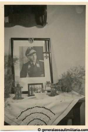 Two photos of a Pilot and his awards