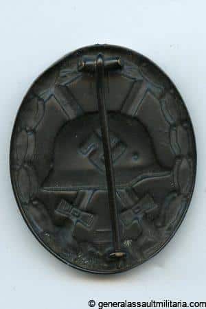 Wound badge in black - 'Chaos Pebbeling'