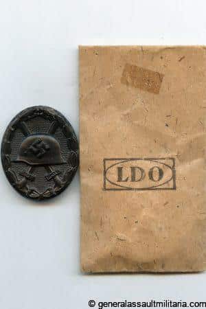 Wound badge in black + packet - Friedrich Orth, Wien