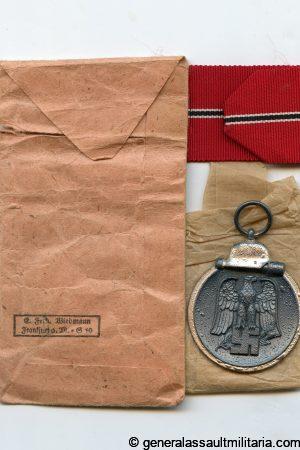 Ost medal + packet - E.F. Wiedmann, Frankfurt