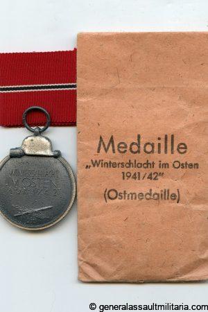 Ost medal + packet - E.F. Wiedmann, Stuttgart