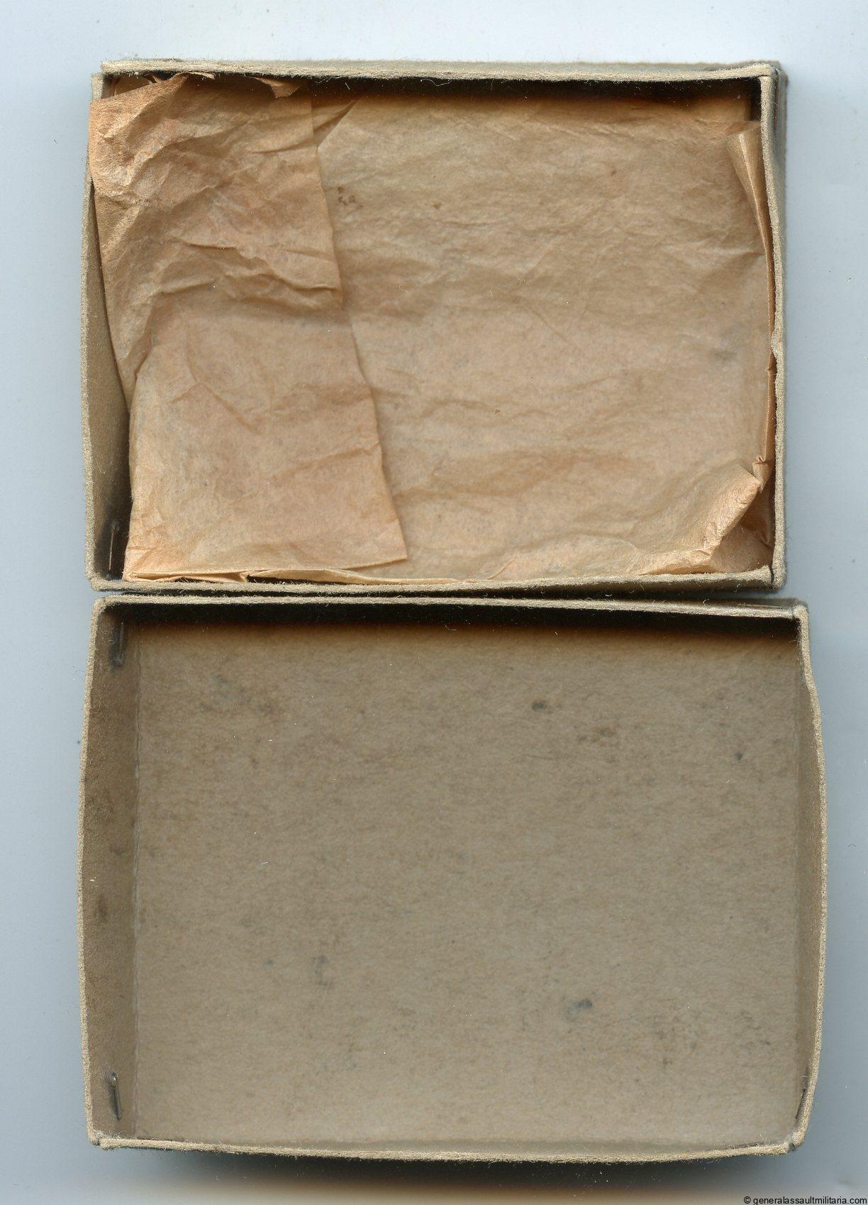 Cardbord box for an assault badge